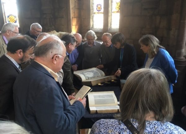 Friends of Lambeth Palace Library looking at rare books on one of their visits.