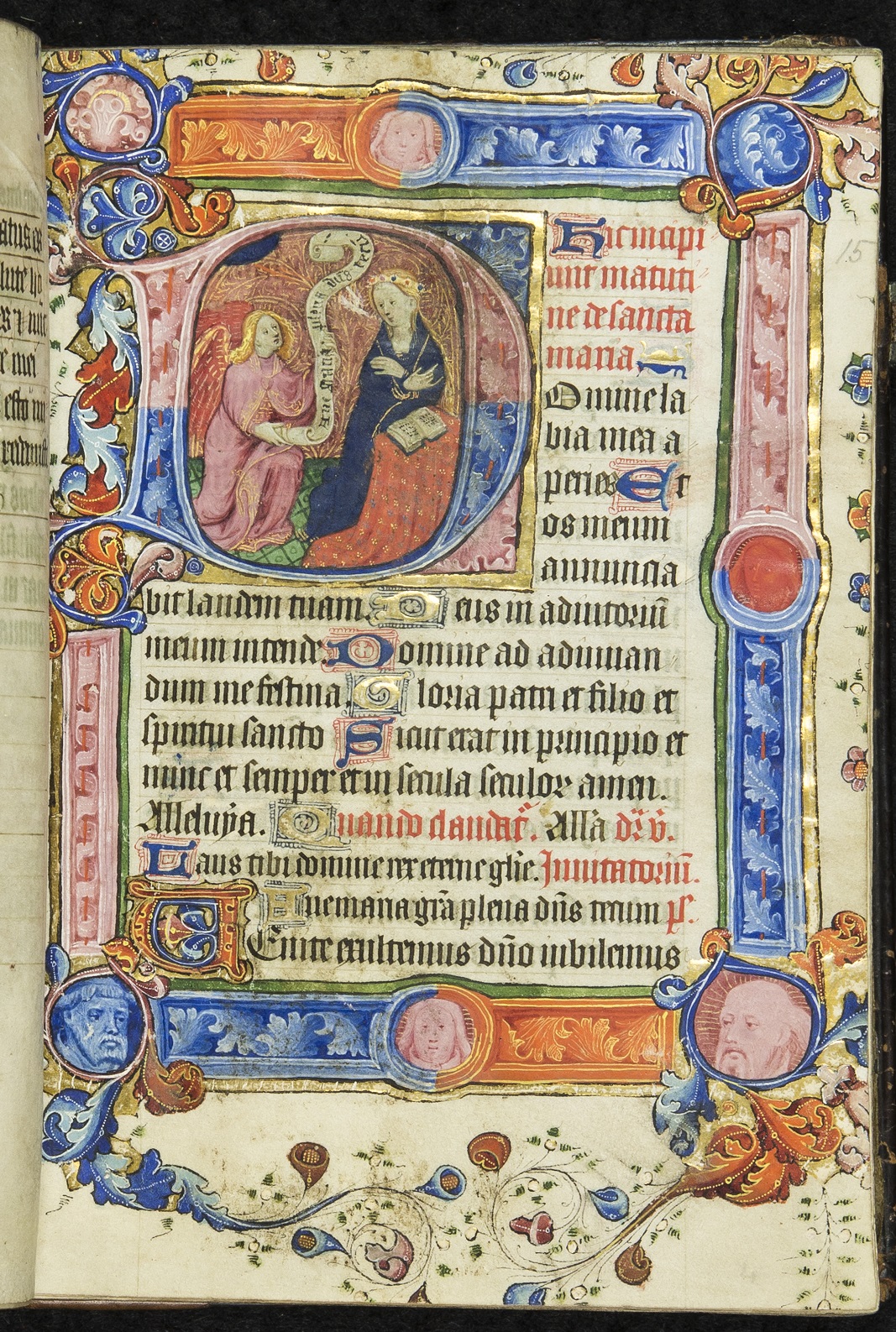 The Annunciation with a scroll unrolling from Gabriel's hand and the Virgin with a book open in front of her.